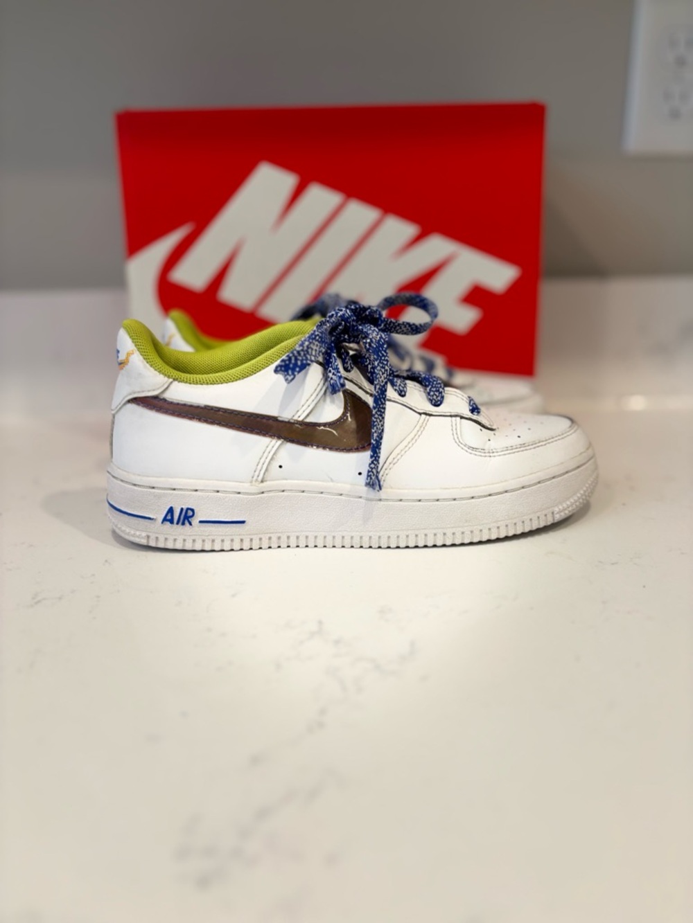Nike Air Force 1 LV8 with iridescent swoosh